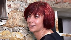 Horny mature lady playing with herself in the garden